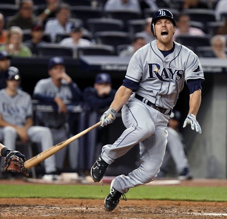 Ben Zobrist reacts after fouling the ball off himself 
