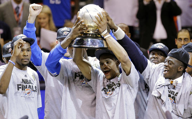 Oklahoma City Thunder celebrate with the western conference trophy 