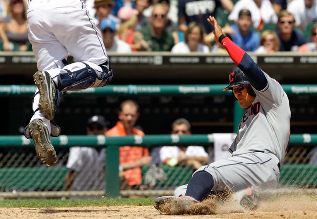Shin-Soo Choo slides safely into home plate  