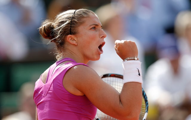 Sara Errani reacts as she plays Australia's Samantha Stosur  