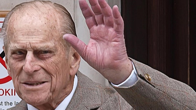 Prince Philip waves as he leaves hospital Saturday 