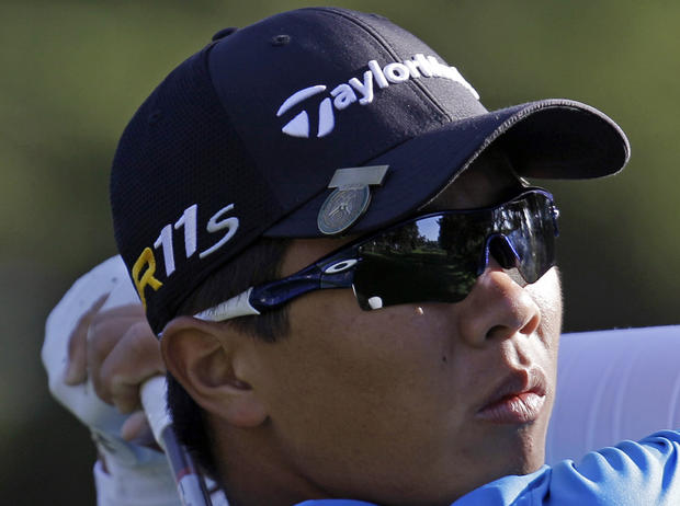 Andy Zhang hits a drive during a practice round 