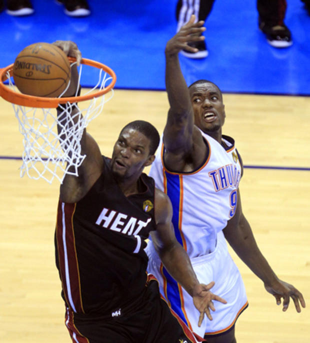 Miami Heat power forward Chris Bosh dunks 