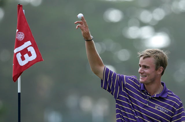 John Peterson reacts after his hole-in-one  