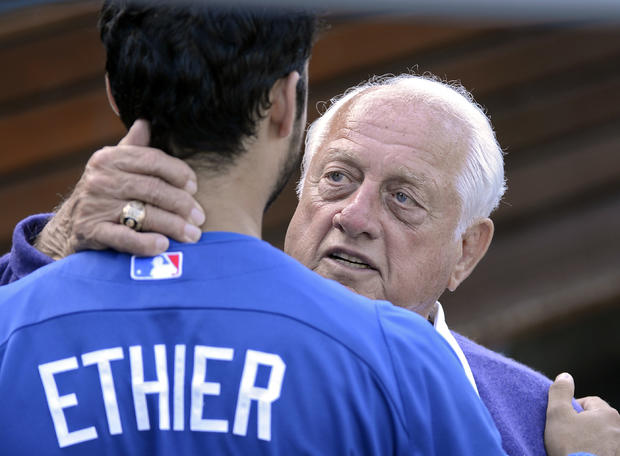 Tommy Lasorda gets a hug from Andre Ethier 