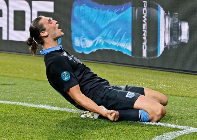 England's Andy Carroll celebrates after he scored the opening goal  