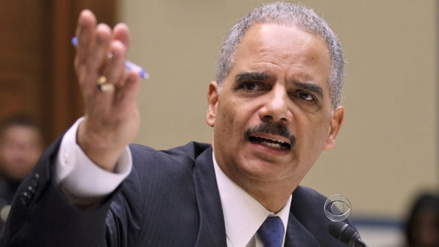 Holder held in contempt  