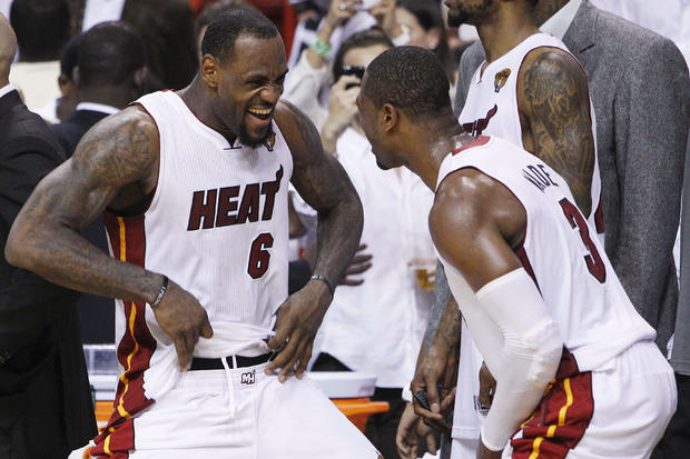 LeBron James and Dwyane Wade react in the final moments  
