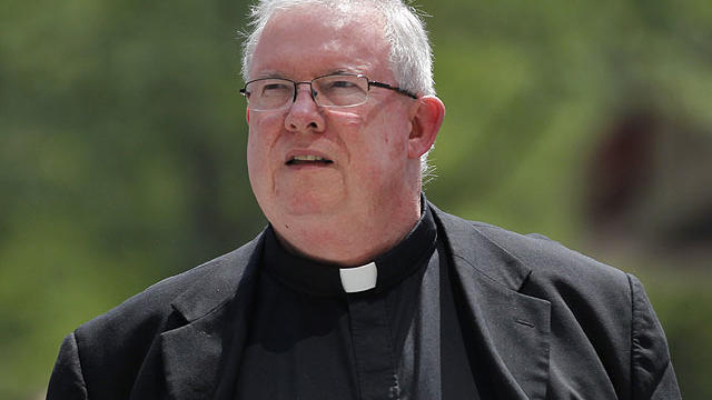 Monsignor William Lynn walks to the Criminal Justice Center, Wednesday, June 20, 2012, in Philadelphia. 