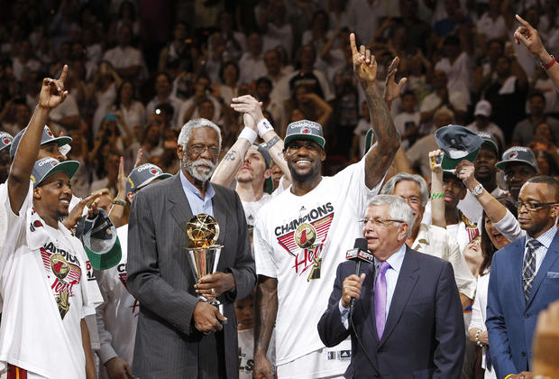 Bill Russell presents the most valuable player award to the Miami Heat's LeBron James  