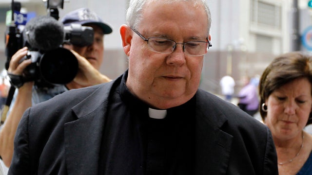 Monsignor William Lynn walks to the Criminal Justice Center June 22, 2012, in Philadelphia. 