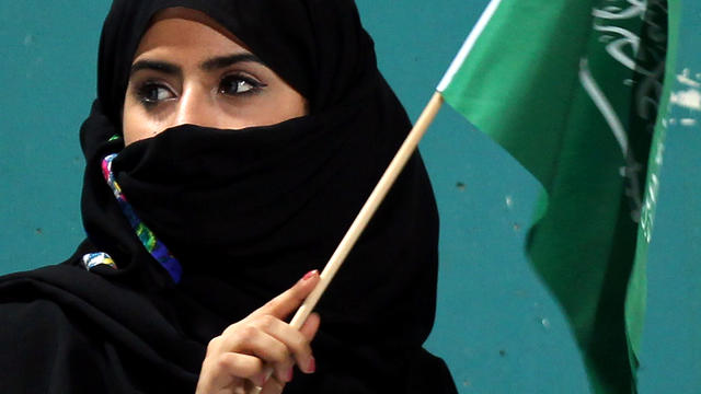 A Saudi woman supports al-Hilal club during its AFC Champions League soccer match against United Arab Emirates' al-Shabab club in Dubai April 4, 2012. 