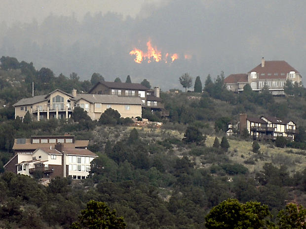 A wildfire burns near Colorado Springs, Colo., June 24, 2012. 