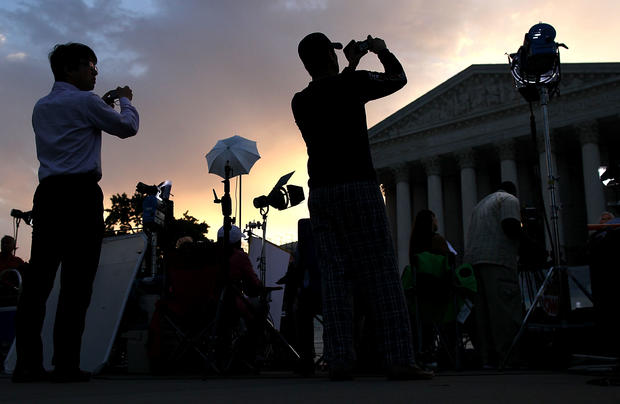 People start to gather in front of the U.S. Supreme Court 