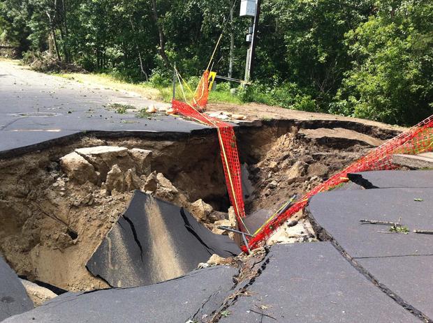 grand-rapids-hole-in-road-july-2nd-2012-storm.jpg 