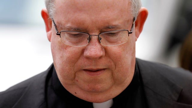 Monsignor William Lynn walks to the Criminal Justice Center, Wednesday, June 20, 2012, in Philadelphia. 