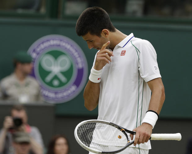 Novak Djokovic reacts during a semifinals match 