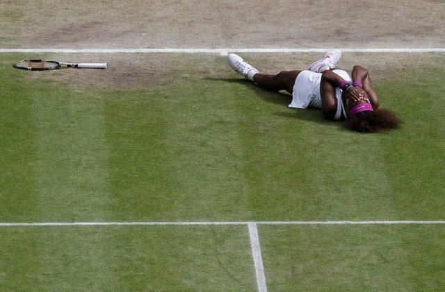 Serena Williams reacts after defeating Agnieszka Radwanska 