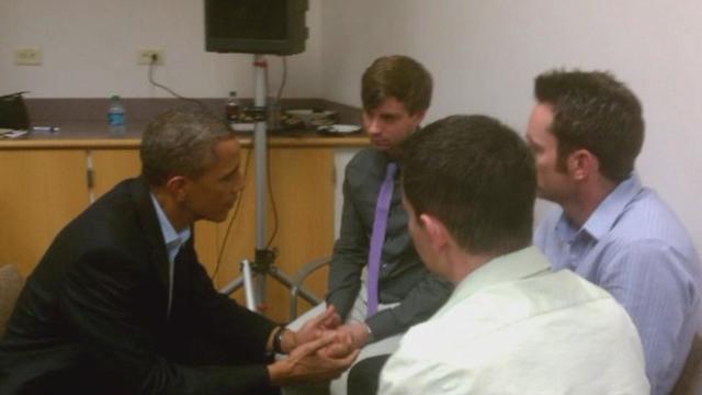 obama-with-victims-families.jpg 