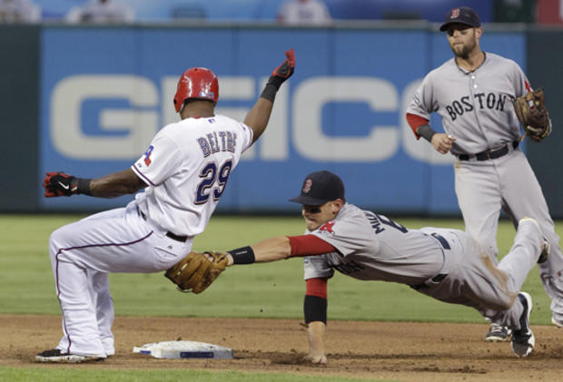 Adrian Beltre escapes the tag at second base  