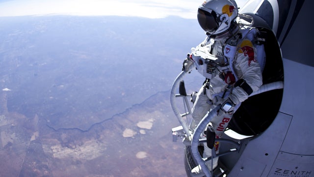 Thursday, March 15, 2012 photo provided by Red Bull Stratos show Felix Baumgartner preparing to jump during first manned test flight for Red Bull Stratos over Roswell, N.M. On Wednesday, July 25, 2012, the 43-year-old Austrian plunged to Earth from altitu 