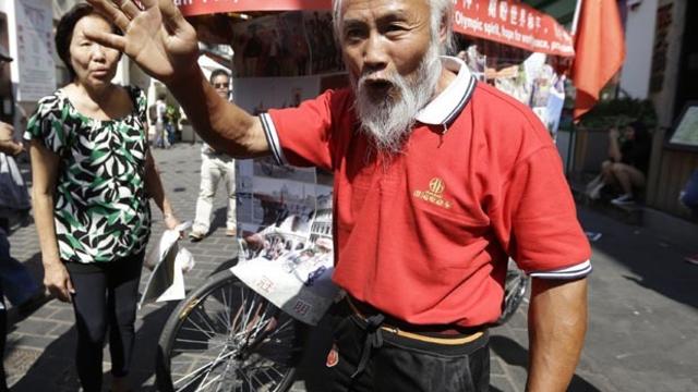 Olympics_rickshaw_AP99891459510.jpg 