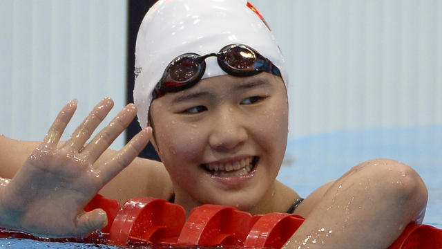 China's Ye Shiwen gestures after competing in women's 200-meter individual medley swimming semifinal at Aquatics Centre in Olympic Park Monday 