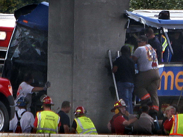 First responders work the scene of a Megabus crash on Interstate 55 near Litchfield, Ill., Aug. 2, 2012. 