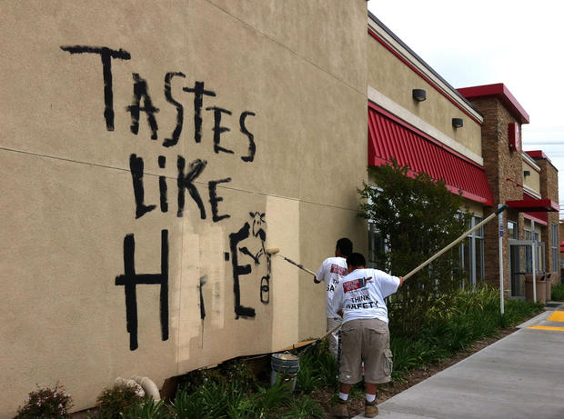 Graffiti is painted on the exterior wall of Chick-fil-A restaurant in Torrance, Calif. on Friday, Aug. 3, 2012.  
