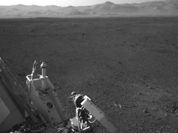 This full-resolution image shows part of the deck of NASA's Curiosity rover taken from one of the rover's Navigation cameras looking toward the back left of the rover. On the left of this image, part of the rover's power supply is visible. To the right of 