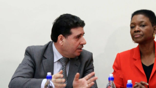 Amid defections, Syria names new PM 