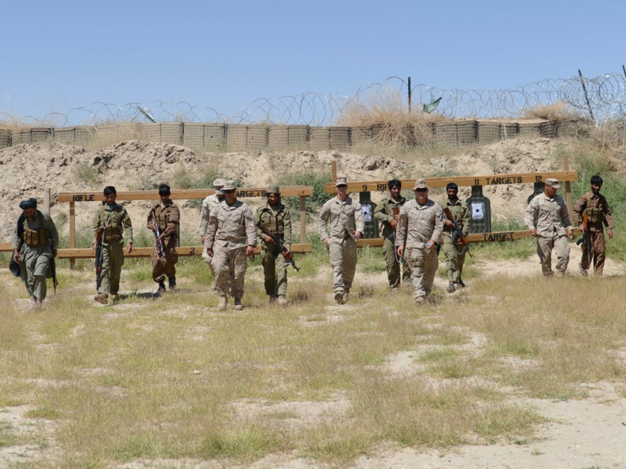 U.S. Marines and Afghan local policemen (ALP) during a training session 