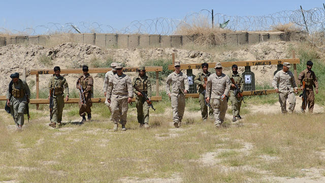 U.S. Marines and Afghan local policemen (ALP) during a training session 