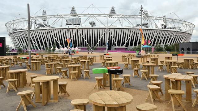 Table and chairs stand empty in Olympic Park in London Monday Aug. 13, 2012 following the end of the London 2012 Olympic Games.  