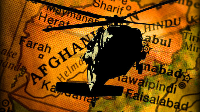 Helicopter over a map of Afghanista 