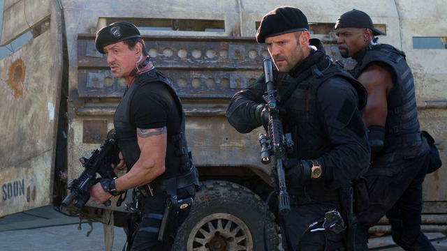 From left: Sylvester Stallone, Jason Statham and Terry Crews in scene from "The Expendables 2" 