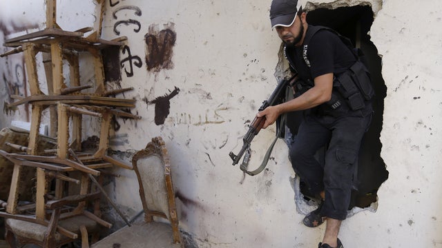 A Sunni gunman is seen during clashes in Tripoli, Lebanon 