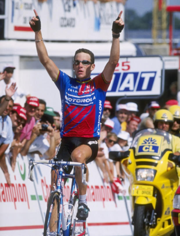 Lance Armstrong celebrates his win during Stage 18 of the Tour De France  
