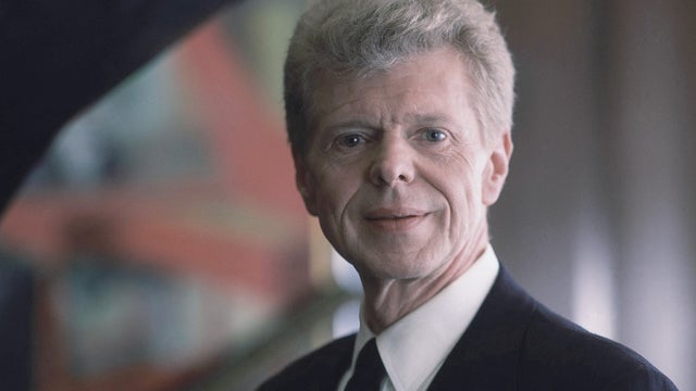 Van Cliburn posing for portrait at Steinway & Sons showroom in New York in March 1994 