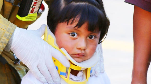 Cops: 100-year-old hits 9 kids with car