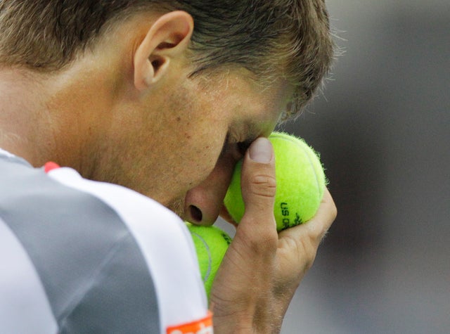 Martin Klizan reacts during his match 