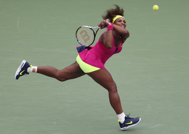 Serena Williams returns a shot to Czech Republic's Andrea Hlavackova 