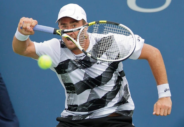 Steve Johnson returns a shot to Richard Gasquet 