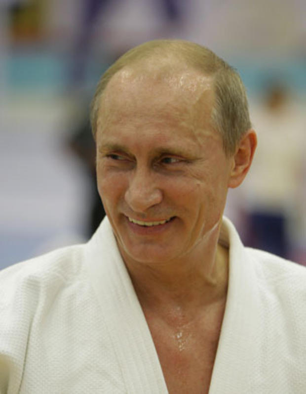 Vladimir Putin smiles as he takes part in a judo training session at the Moscow sports complex 