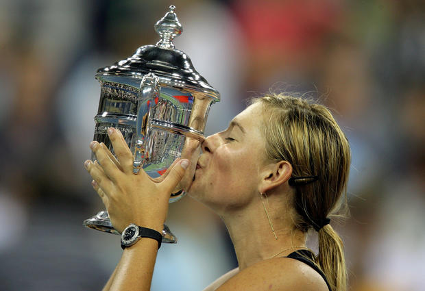 Maria Sharapova of Russia kisses the championship trophy  