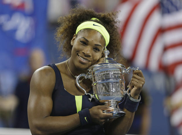 Serena Williams holds the championship trophy after beating Victoria Azarenka 