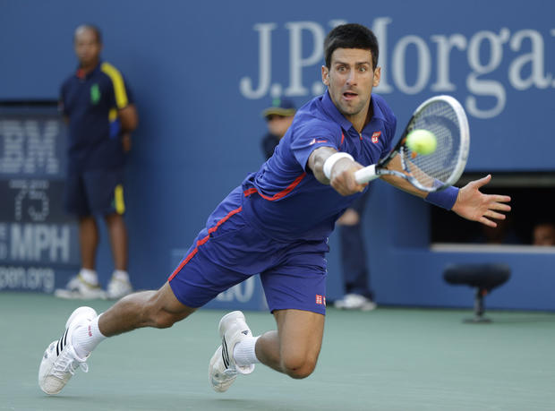 Novak Djokovic returns a shot  