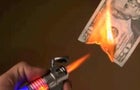 burning-money-244x183-Flickr-purpleslog.jpg 