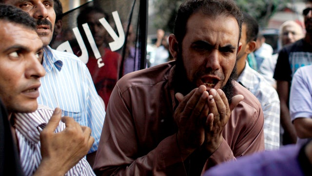 An Egyptian man chants slogans during a demonstration in front of the U.S. Embassy in Cairo Sept. 12, 2012. 