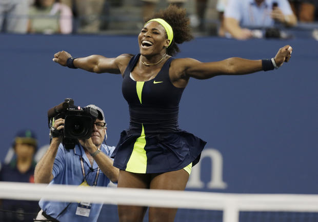 Serena Williams reacts after beating Victoria Azarenka 